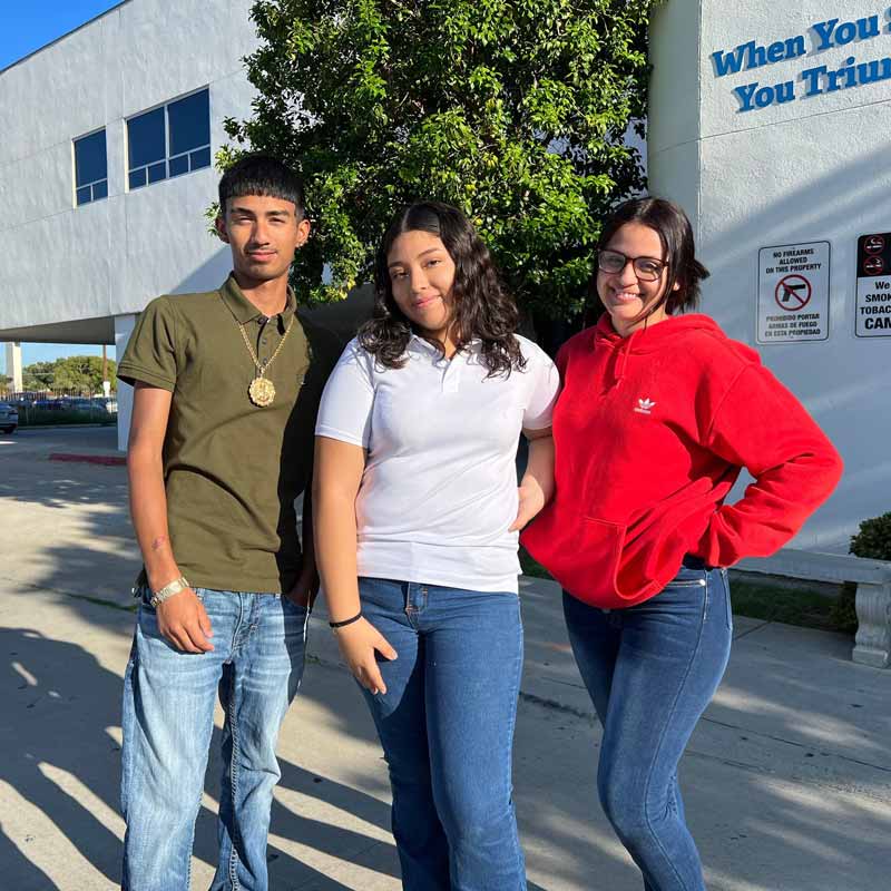 Group of three Triumph Public High School students on campus